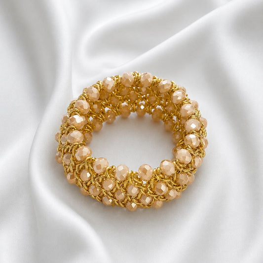 Brazalete elasticado de cristal facetado nude