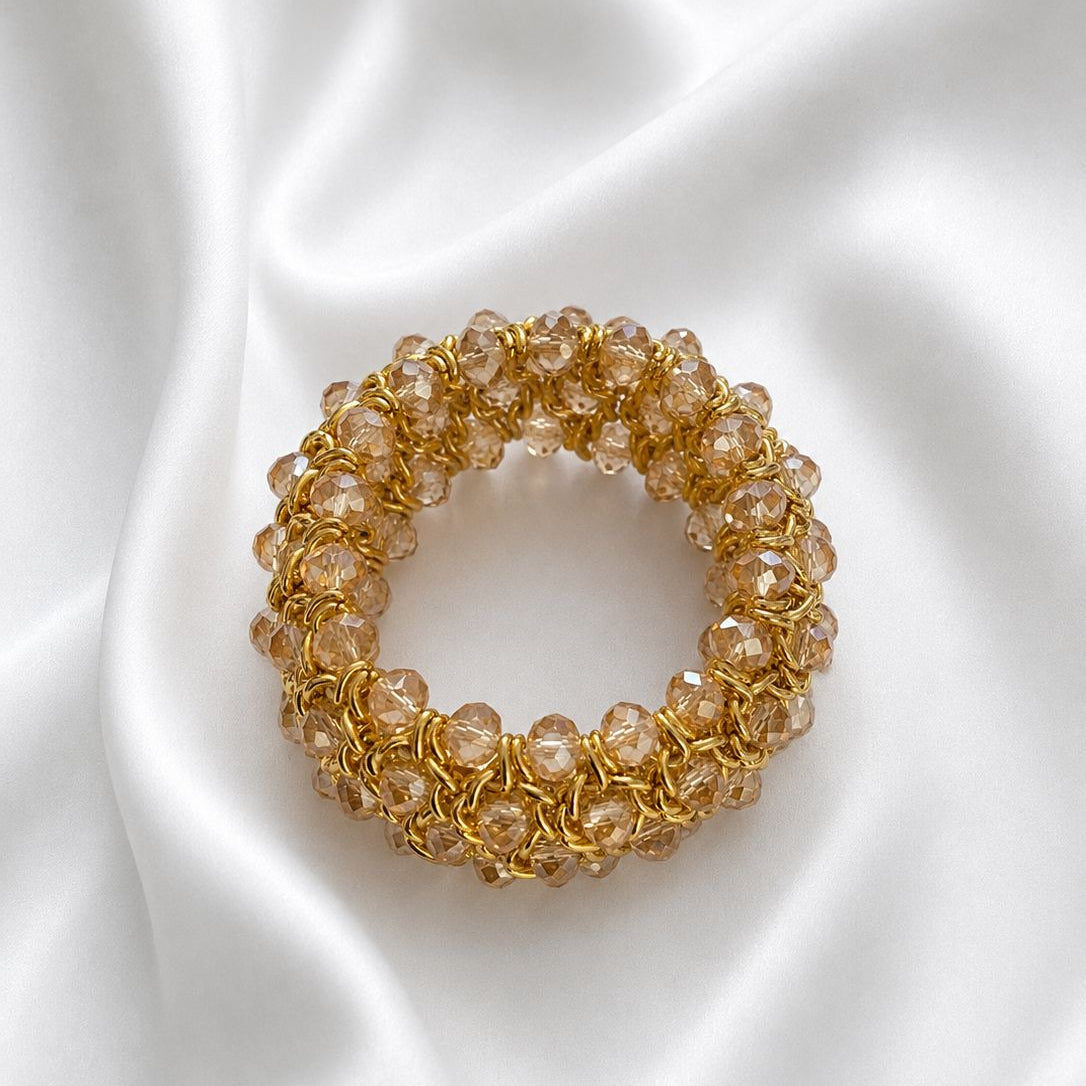 Brazalete elasticado de cristal facetado nude tornasol