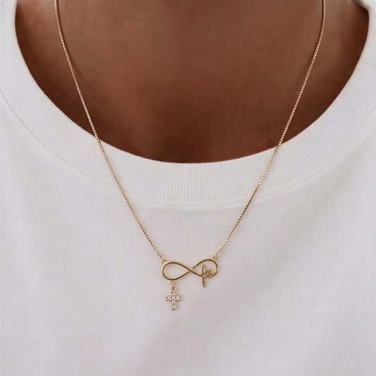Collar con infinito y cruz con circón - Mide 48 cm