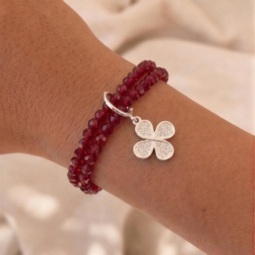 Pulsera elasticada - Cristal facetado rojo vino - Trébol con circón